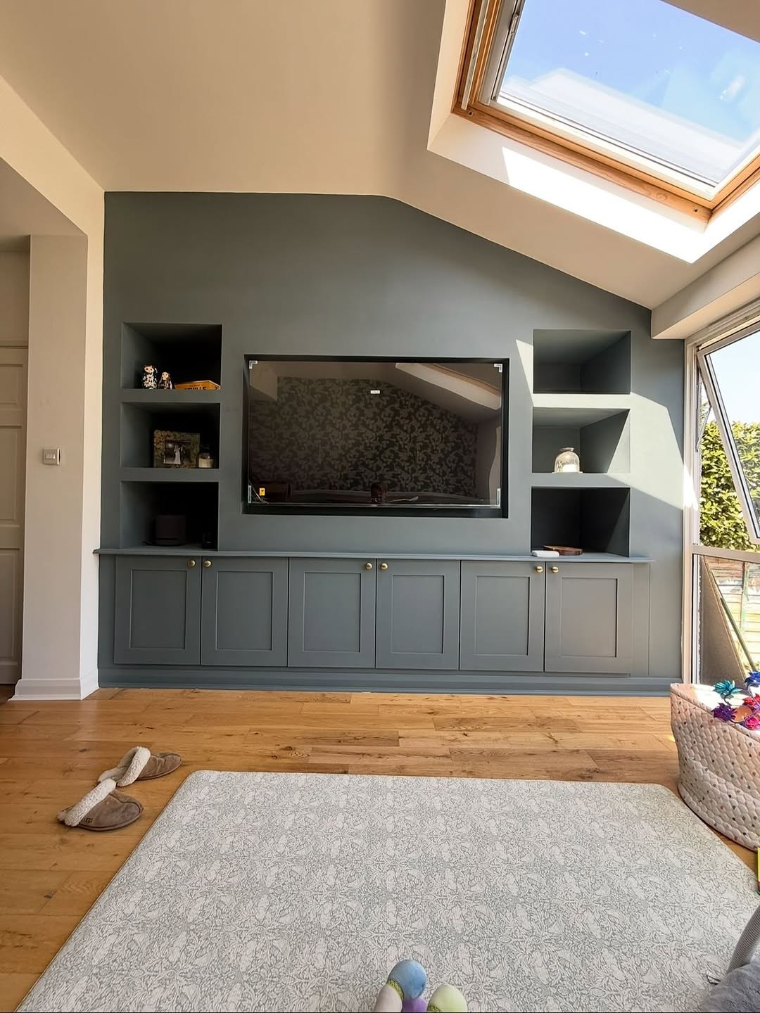 Built-in media wall with cabinets and shelves